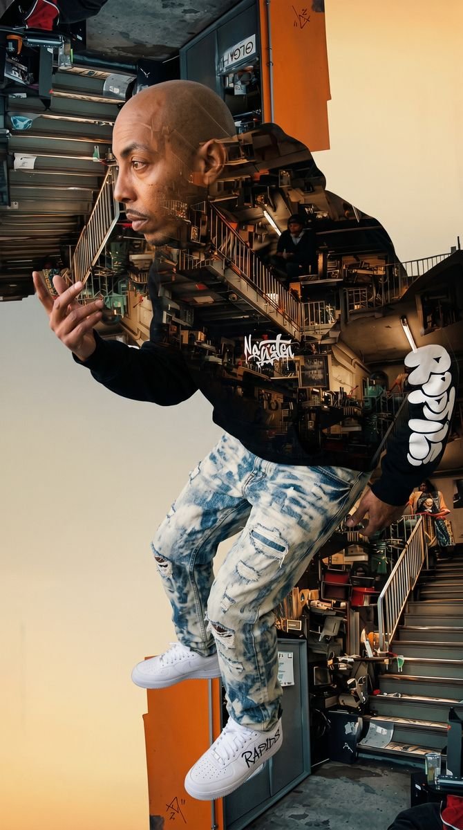 Black zip-up hoodie styled in a studio editorial